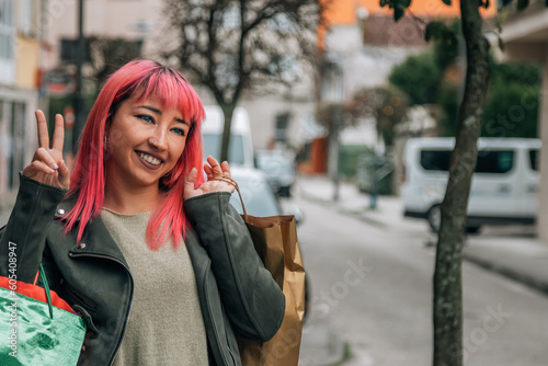 urban woman shopping with bags on the street