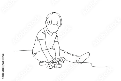Single one-line drawing boy playing blocks. Children playing with toys concept. Continuous line drawing illustration