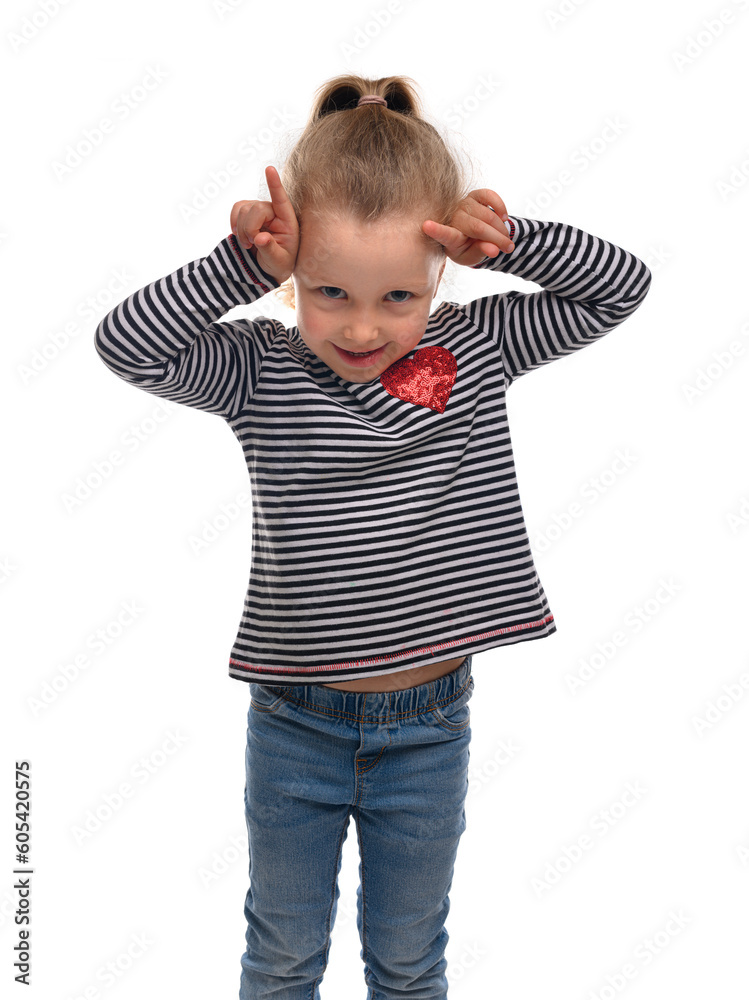 Playful little girl showing horns isolated on white background. Playful little girl showing horns isolated on white background.