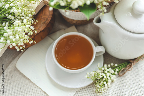 Cup of hot tea and spring home interior. good morning concept
