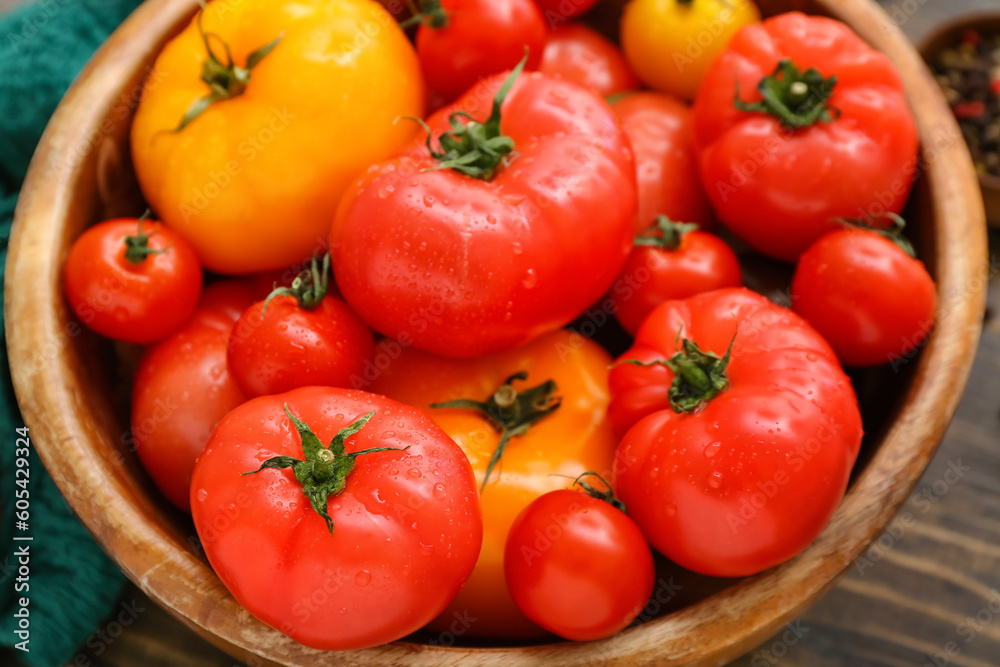 Bowl with different fresh tomatoes, closeup Bowl with different fresh tomatoes, closeup
