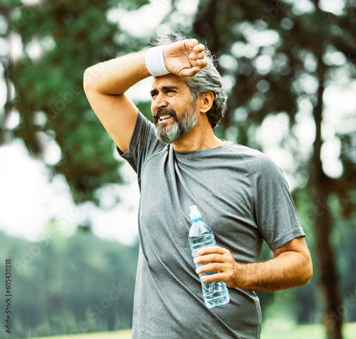 outdoor senior fitness man lifestyle active sport exercise healthy fit retirement jogging running bottle water drink drinking thirsty dehydration hudration
