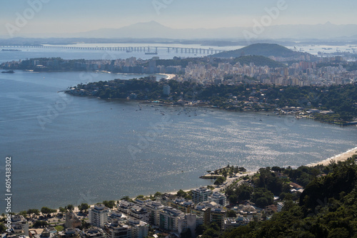 Beautiful view of Rio de Janeiro, Brazil seen from Niterói. With many hills in the background, Guanabara Bay, Rio Niterói Bridge, Icaraí, Charitas, beaches, pier with boats. Sunny day