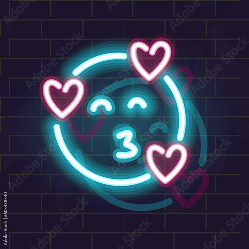 Neon love and kiss emoji. Isolated smile on dark wall background.