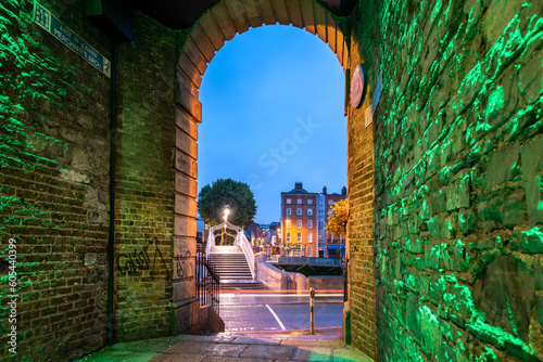 Photography View of narrow archway to Dublin streets at night, Ireland