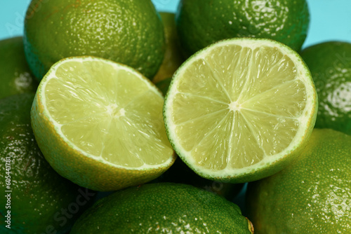 Texture of fresh limes as background, closeup