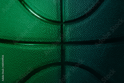 Closeup detail of blue and green basketball ball texture background. Horizontal sport theme poster, greeting cards, headers, website and app © Augustas Cetkauskas