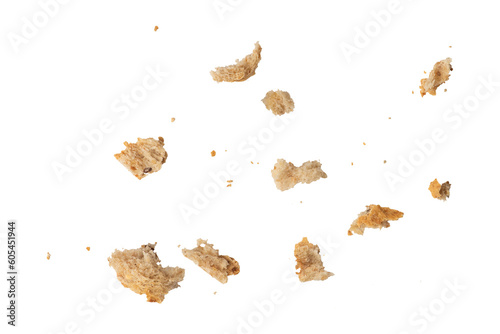 Fototapeta Crumbs of fresh whole grain bread isolated on white background