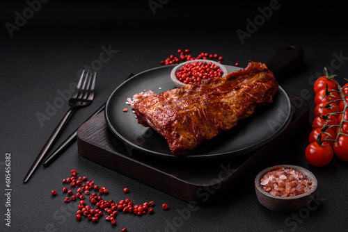 Delicious grilled or smoked pork ribs with salt, spices and herbs