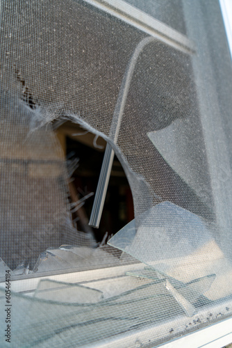 Broken window at the Alameda Naval Base in Alameda, CA photo