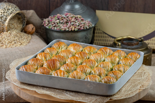 Traditional turkish baklava pistachio pastry. Dilberdudagi, ozel kesim baklava, cikolatali baklava, fistikli baklava. 
 photo