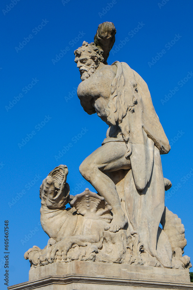 Sculpture of man and dragon Sculpture of man and dragon