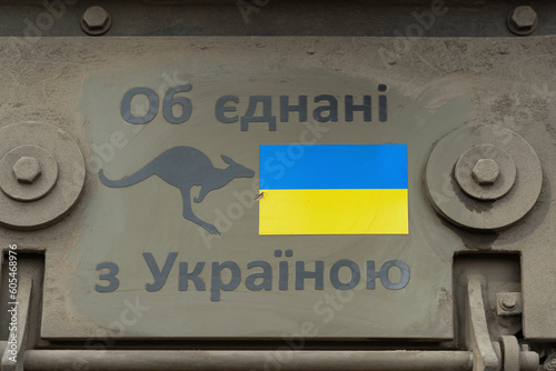 Silhouette of a kangaroo, the flag of Ukraine and the inscription 