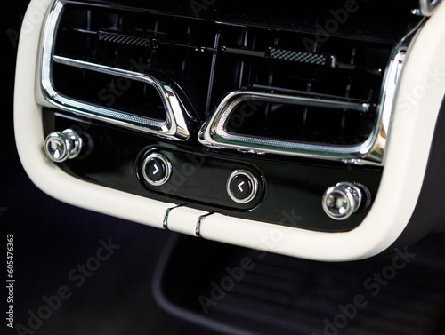 control buttons for rear seats in luxury comfortable car © AvokadoStudio