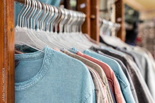 Fototapeta Naklejka Na Ścianę i Meble -  Sale of men's T-shirts of different colors and sizes, a large offer of street trade, Greece, Crete, Matala