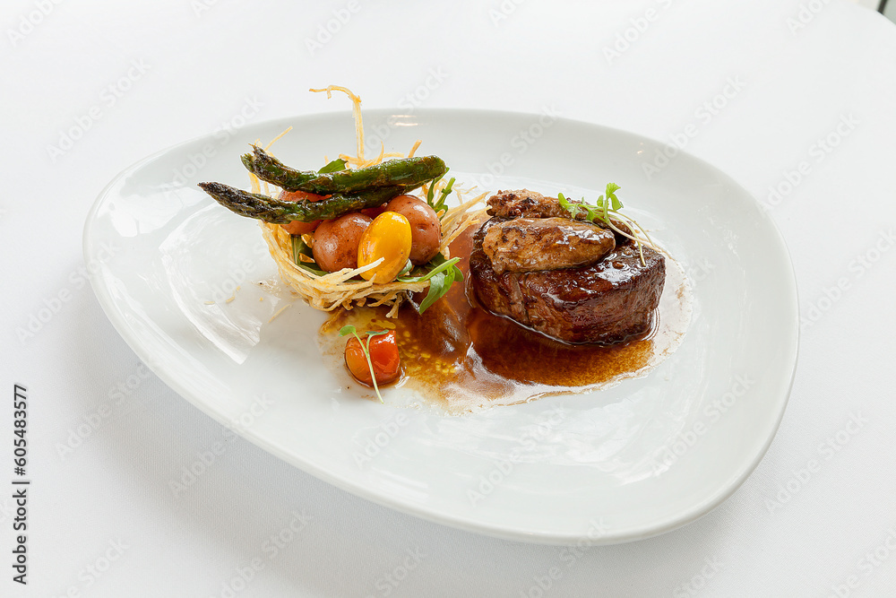 Fillet Mignon with potato asparagus salad isolated