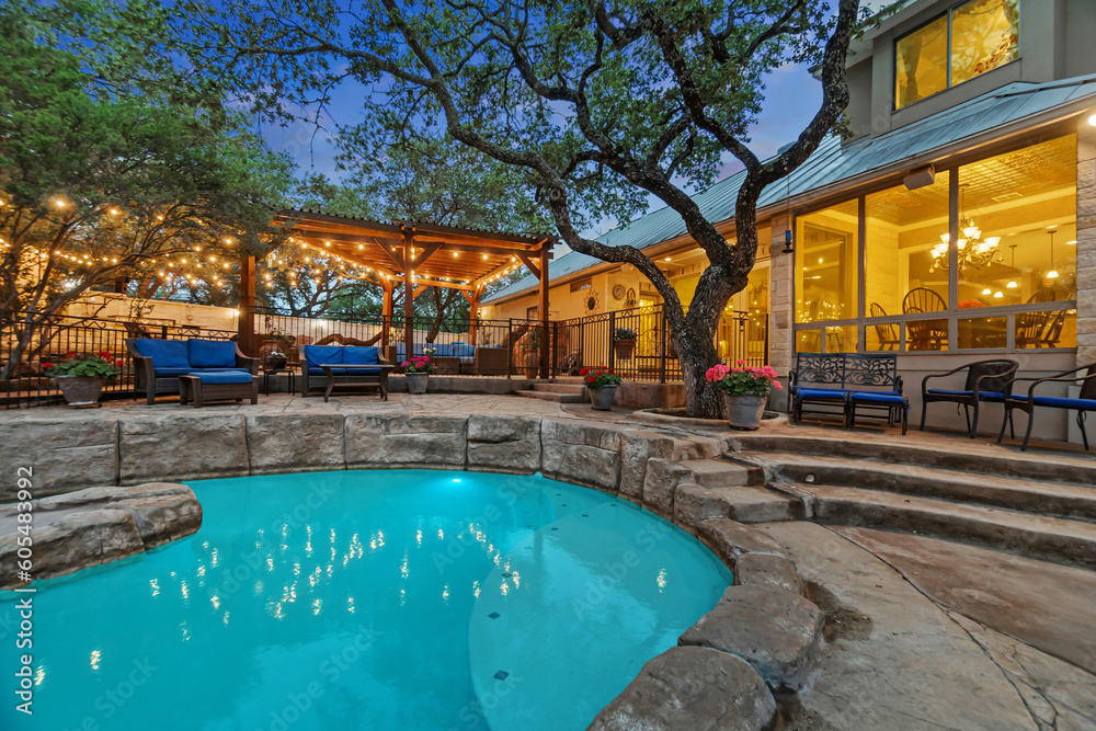 a pool at sunset 