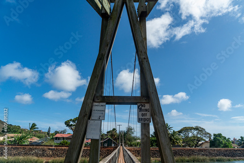 Shot of the Hanapepe Swinging Bridge in Kauai, Hawaii photo