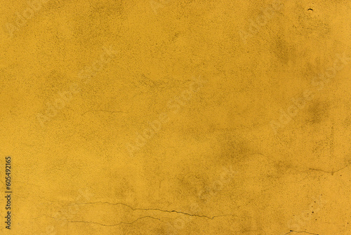 yellow painted house wall with texture as background 2