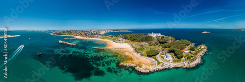 Aerial drone panoramic view of Magdalena Peninsula, a 69-acre peninsula near the entrance to the Bay of Santander in the city of Santander, Cantabria, north coast, Spain, Europe photo