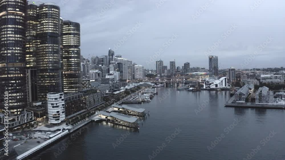 Architecture, buildings and drone of city port for infrastructure, skyscraper and evening. Ocean, travel and water with aerial view of Australia dock for cityscape, seaside and industrial development Architecture, buildings and drone of city port for infrastructure, skyscraper and evening. Ocean, travel and water with aerial view of Australia dock for cityscape, seaside and industrial development