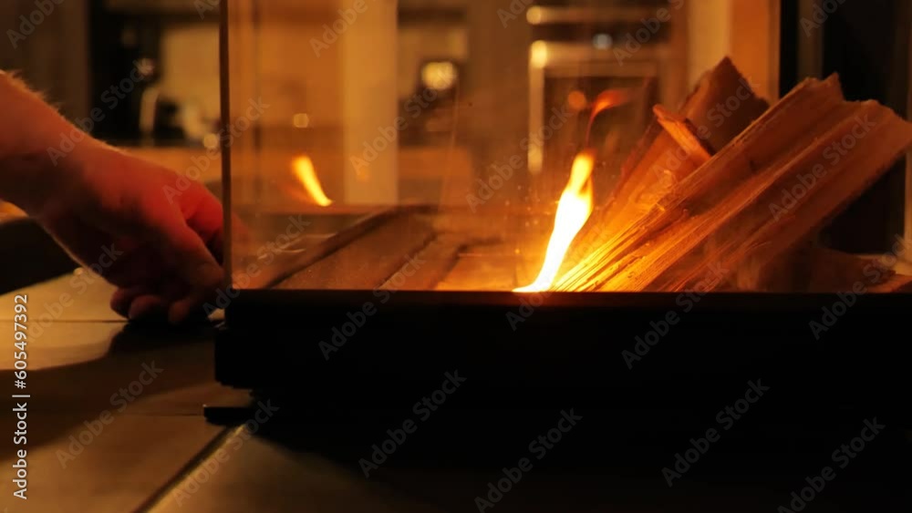 Fireplace in the interior. home fireplace on a cozy room background. slow motion.Warm cozy home atmosphere.Fire up the fireplace. 4k footage Fireplace in the interior. home fireplace on a cozy room background. slow motion.Warm cozy home atmosphere.Fire up the fireplace. 4k footage