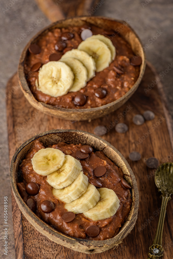 Fototapeta premium Coconut bowls with oat porridge