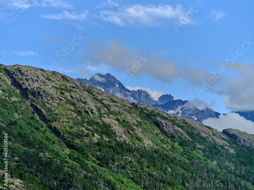 Clouds working down the mountainside onto the lower landscape on the Klondike Highway near the Alaska and British Columbia border