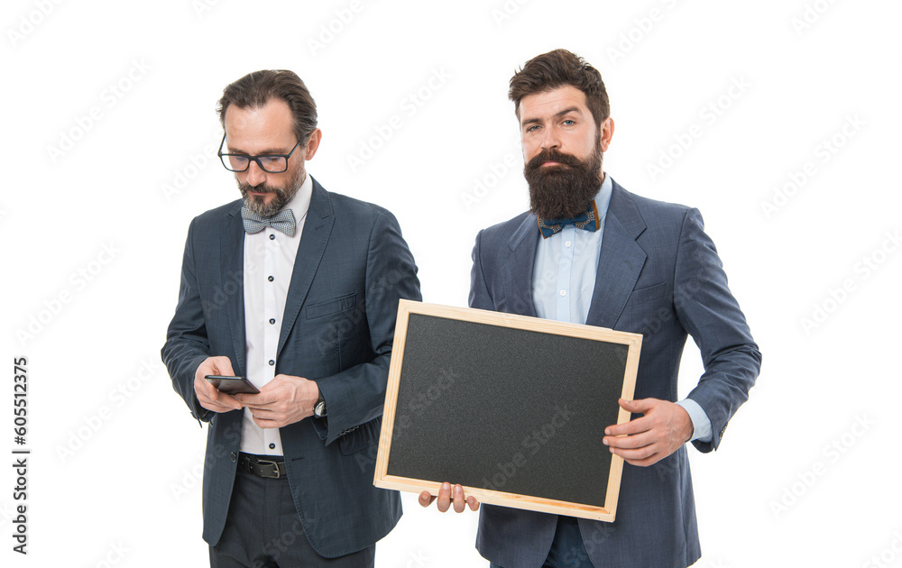 Men bearded guys wear formal suits hold blackboard. Well groomed business man hold chalkboard. Useful information. Business announcement. Start up business project. Launching business project Men bearded guys wear formal suits hold blackboard. Well groomed business man hold chalkboard. Useful information. Business announcement. Start up business project. Launching business project