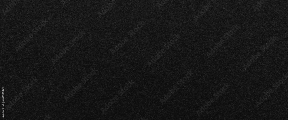 Texture of a wood splinter pressed wall, black painted surface of dark pressed wood chipboard texture background, the texture of the wood particle board painted black color.
