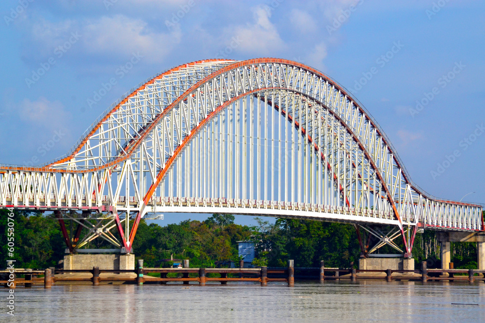 The Tayan Bridge arch is a bridge that crosses the Kapuas River and is the third longest bridge in Indonesia connecting Tayan City and Piasak Village, Sanggau Regency, West Kalimantan Province