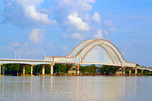 The Tayan Bridge arch is a bridge that crosses the Kapuas River and is the third longest bridge in Indonesia connecting Tayan City and Piasak Village, Sanggau Regency, West Kalimantan Province © Nasruddin
