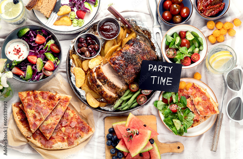 Family dinner or lunch. Many dishes on the table. Top view, copy space Family dinner or lunch. Many dishes on the table. Top view, copy space