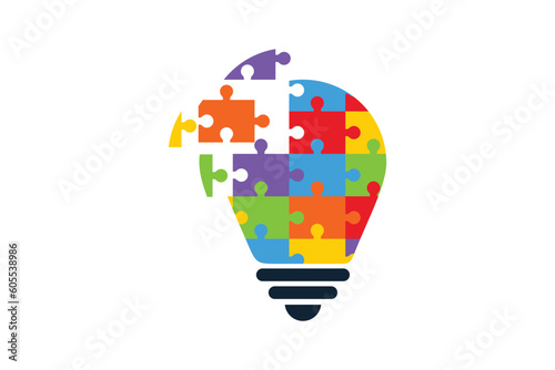 Puzzle light bulb logo icon. Lightbulb, lamp with jigsaw inside, brain concept of innovation.