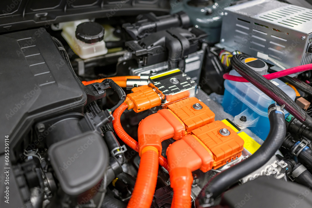 Orange connecting elements of a hybrid automobile engine with elements electronic distribution blocks Orange connecting elements of a hybrid automobile engine with elements electronic distribution blocks