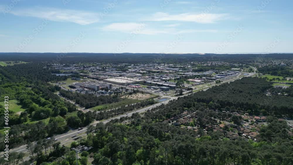 View of E.Leclerc La Teste De Buch Mall and supermarket area in Western France, Aerial approach shot