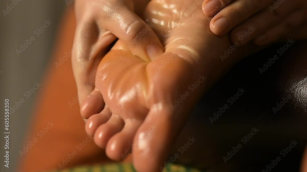 massage of acupuncture points on the feet, Ayurvedic medicine, panchakarma, oiling the body with medicinal oils