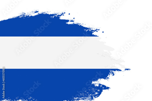 El Salvador flag on a stained stroke brush painted isolated white background with copy space
