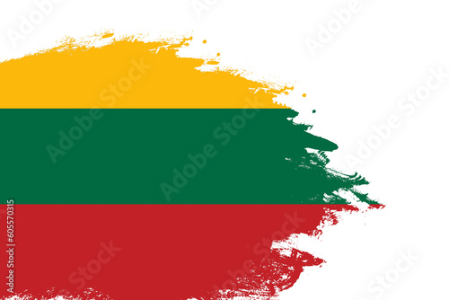 Lithuania flag on a stained stroke brush painted isolated white background with copy space