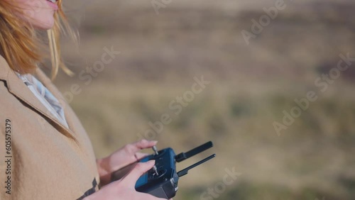 girl flying a drone alone