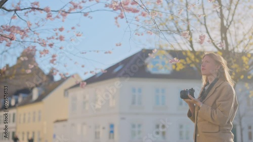 danish girl taking photo outdoors