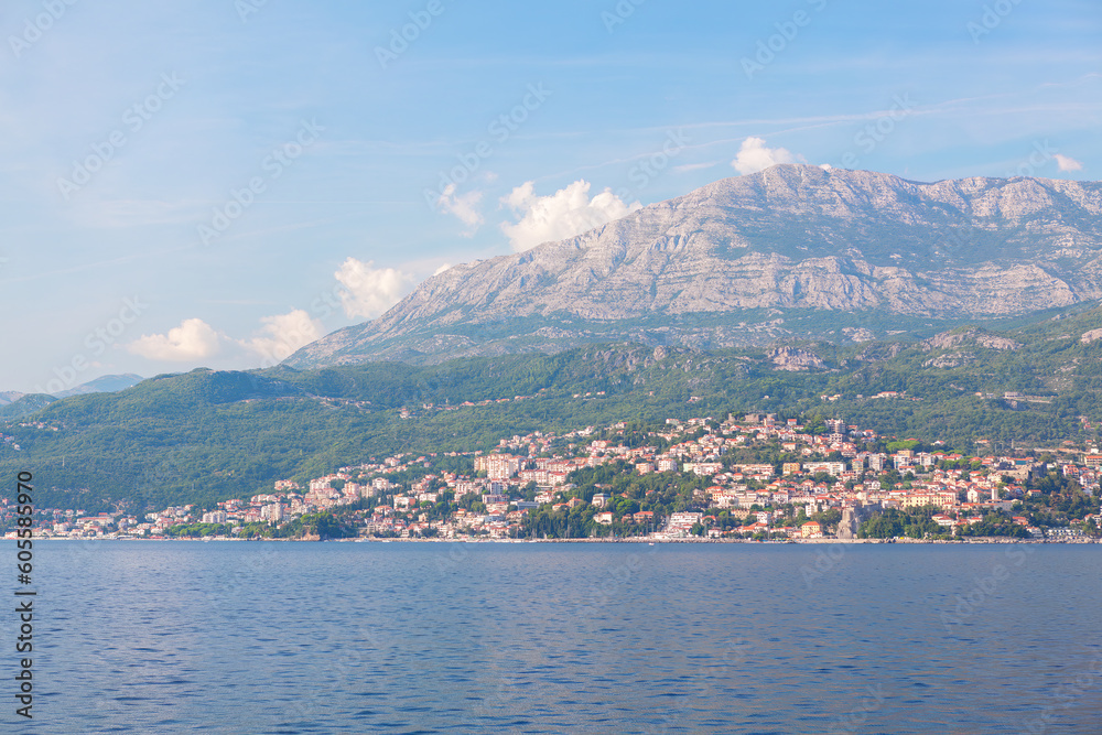 Herceg Novi city in Montenegro at Kotor Bay . Coastal city in Balkans . Houses at the hill