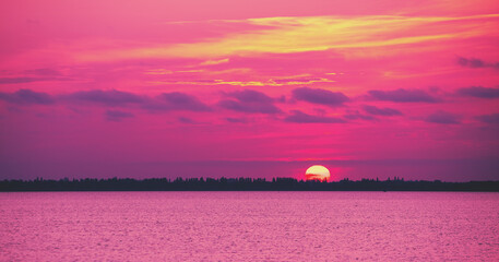 Foto auf Acrylglas Pantone 2023 Viva Magenta Seascape in the early morning. Sunrise over the sea. Nature landscape  © vvvita