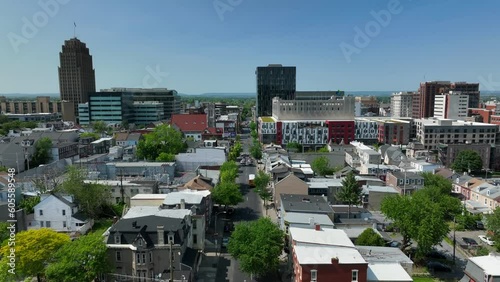 Urban city Allentown PA on sunny day. Rising aerial reveal shot.