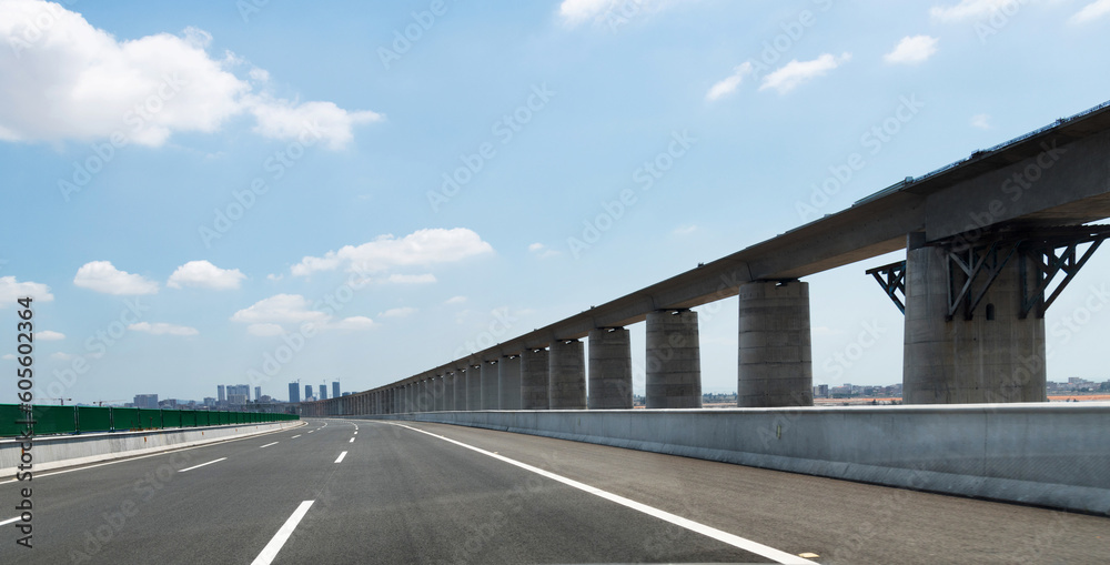 Fototapeta premium Empty bridge highway under blue sky
