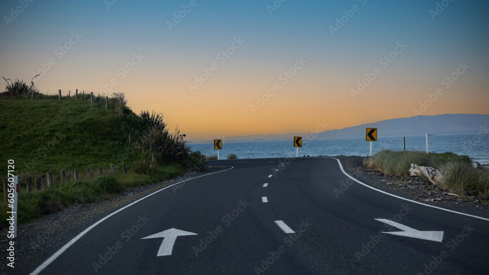  Aerial view of sloping and curvy road, background for vacation travel