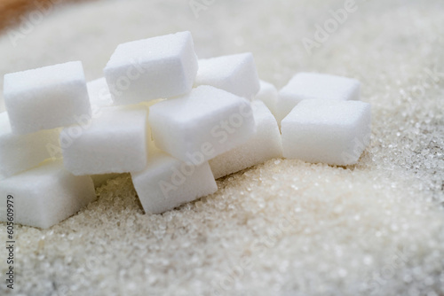 Sugar cubes on top of granulated sugar