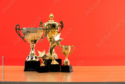 Fotografie Group of trophies on wooden table