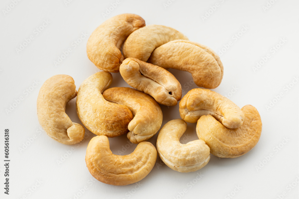 Dried cashew nuts. Macro shot. Raw snack. Pile cashew nuts without shell. Whole nut kernels Dried cashew nuts. Macro shot. Raw snack. Pile cashew nuts without shell. Whole nut kernels