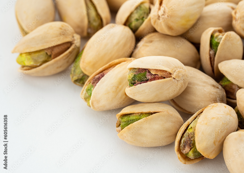 Salted Pistachios for Beer, Macro, Spin. Isolated Background of a Beer Snack of Salted Pistachio Nuts. Healthy Delicious Pistachios. Salted roasted pistachio macro Salted Pistachios for Beer, Macro, Spin. Isolated Background of a Beer Snack of Salted Pistachio Nuts. Healthy Delicious Pistachios. Salted roasted pistachio macro